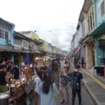 Visitors browsing stalls on Thalang Road at Phuket Sunday Walking Street Market